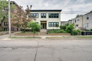 an empty street with a house on a street at Minneapolis Vacation Rental - 1 Mi to Downtown! in Minneapolis
