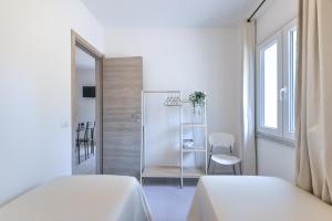 A bed or beds in a room at Casa vacanze con piscina