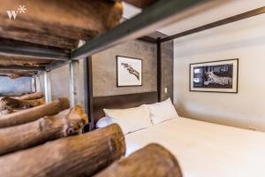 Cama ou camas em um quarto em Las Mimosas by Wynwood House