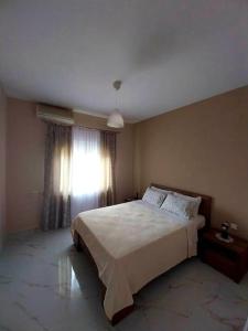 Кровать или кровати в номере OLGAS house no1 in Polygyros Chalkidiki