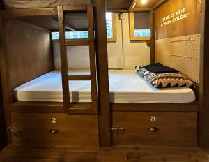 a couple of bunk beds in a trailer at Wontonmeen in Hong Kong