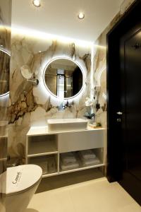 Koupelna v ubytování Caramel Boutique Hotel