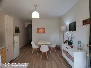a kitchen and dining room with a table and chairs at Nely's Luxury Home in Nydri +49 photos