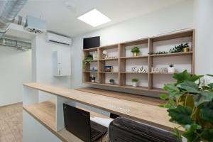 a office with a desk with a computer on it at Hostel Elli in Split