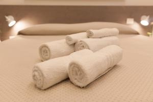 Ένα ή περισσότερα κρεβάτια σε δωμάτιο στο A Casa di Nonna