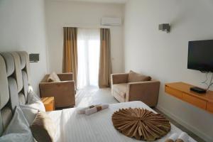 TV o dispositivi per l'intrattenimento presso Hotel Credo