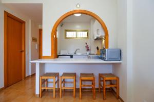 Kuchyň nebo kuchyňský kout v ubytování CORDOBA HomeStay by Turismar