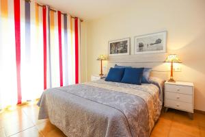 Postel nebo postele na pokoji v ubytování CORDOBA HomeStay by Turismar