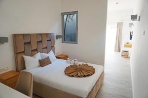Letto o letti in una camera di Hotel Credo
