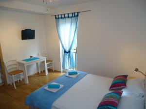 Postel nebo postele na pokoji v ubytování Guesthouse Lisica