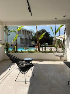 The swimming pool at or close to Three Seasons