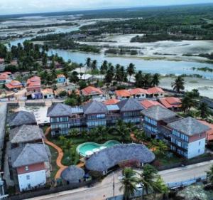 an aerial view of a resort with a body of water at Villas BobZ Apt.109 in Barra Grande