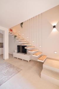 Μια τηλεόραση ή/και κέντρο ψυχαγωγίας στο Apartments Mila