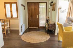 Posezení v ubytování Precioso apartamento con jardín privado a 4 km de Puigcerdà + 22 fotografií