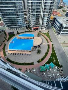สระว่ายน้ำที่อยู่ใกล้ ๆ หรือใน GG Home - new studio in White Sails with view on 13th floor