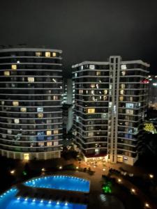 สระว่ายน้ำที่อยู่ใกล้ ๆ หรือใน GG Home - new studio in White Sails with view on 13th floor
