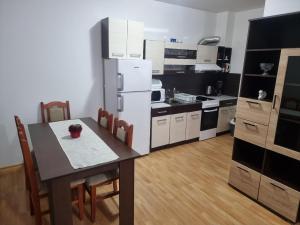 A kitchen or kitchenette at Sunny Day 6