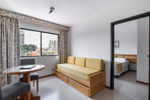 Postel nebo postele na pokoji v ubytování Hotel Flat Petras Residence