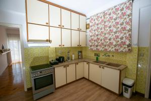 A kitchen or kitchenette at Harmony Apartment Kavala
