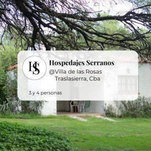 una señal frente a una casa blanca en Hospedajes Serranos, Cabañas Aaron, solo acepto reservas por privado en Villa Las Rosas