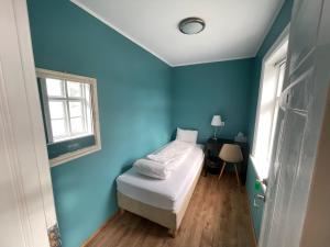 Postel nebo postele na pokoji v ubytování Mánagisting Guesthouse