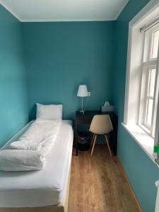 Postel nebo postele na pokoji v ubytování Mánagisting Guesthouse