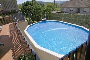 an overhead view of a swimming pool on a balcony at Os de Rey in Pontevedra