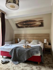 Posteľ alebo postele v izbe v ubytovaní Hotel Nosal Ski & Wine