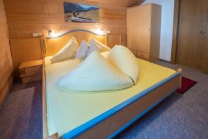 Letto o letti in una camera di Haus Waldrast