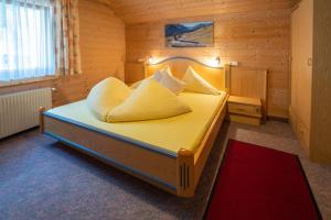 Postel nebo postele na pokoji v ubytování Haus Waldrast