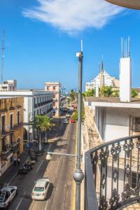 a view of a city street from a balcony at M&uacute;cara hotel in Veracruz