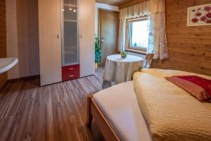 Letto o letti in una camera di Haus Waldrast