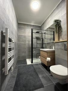 Kylpyhuone majoituspaikassa La Maison des Amis en Normandie