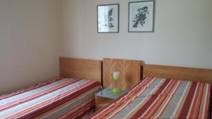 Cama o camas de una habitación en Prive das Thermas 405