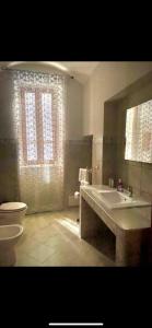 Phòng tắm tại Appartamento Napoli - Parva Domus