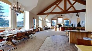 a dining room with a long table and chairs at 36 James Court in Dillon