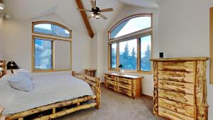 a bedroom with a bed and two windows at 36 James Court in Dillon +49 photos