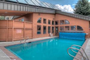 a house with a swimming pool in front of it at 36 James Court in Dillon