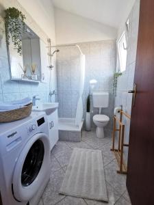 Kúpeľňa v ubytovaní Apartments Rhopal