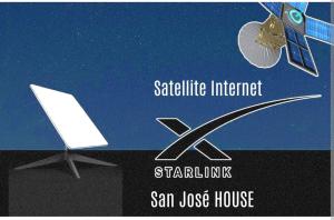 a sign for a satellite initiative internet and a laptop at San José HOUSE in Leticia