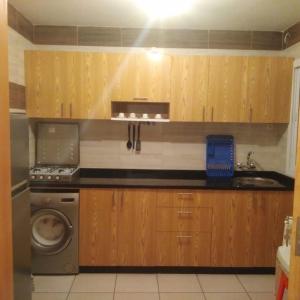 Kuchyň nebo kuchyňský kout v ubytování Appartement calme et agréable