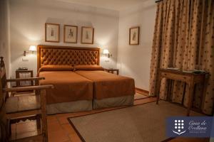 Postel nebo postele na pokoji v ubytování Hotel Boutique Casa de Orellana
