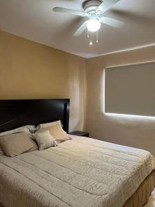 Postel nebo postele na pokoji v ubytování Tranquilidad y comodidad para ti