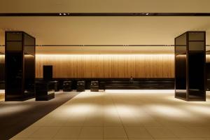 a large room with a large wall with lights at Hotel Gracery Shinjuku in Tokyo