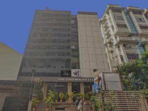 a building with a sign for the epworth hotel at Collection O THE CROWN HOTEL in Hyderabad