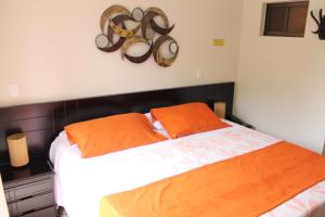 Postel nebo postele na pokoji v ubytování Hotel Castellana Inn