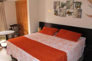 Postel nebo postele na pokoji v ubytování Hotel Castellana Inn