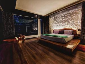 Postel nebo postele na pokoji v ubytování CantalaRana Lodge