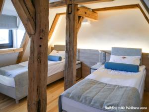 Postel nebo postele na pokoji v ubytování Hotel Spichrz + 37 fotografií