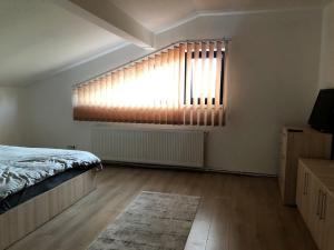 Postel nebo postele na pokoji v ubytování Casa Dima